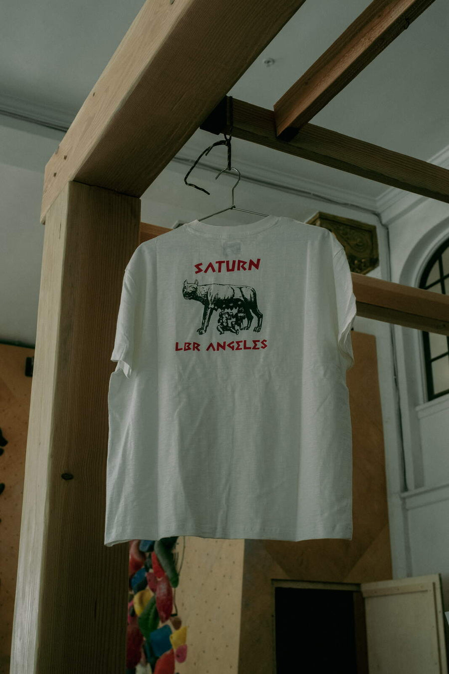 Saturn x LBR collab tee hanging in the gym
