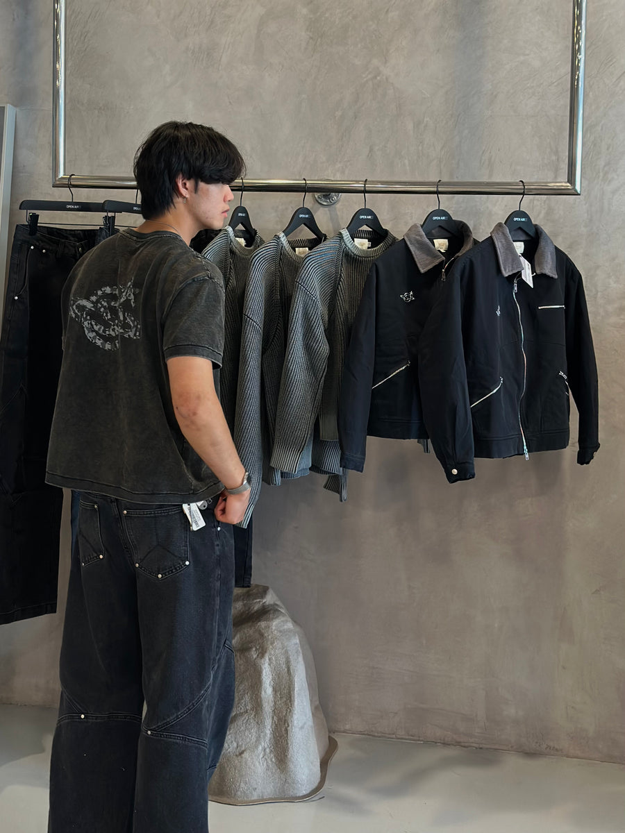 Saturn jackets hanging in a stockist