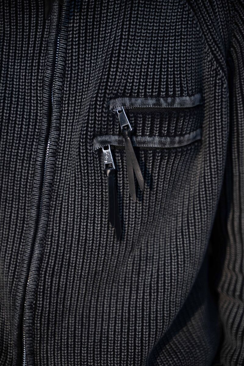 Zip pocket detail on a Saturn knit jacket