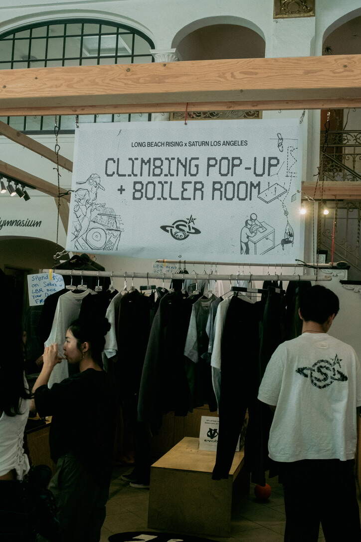 Event banner over the merch rack