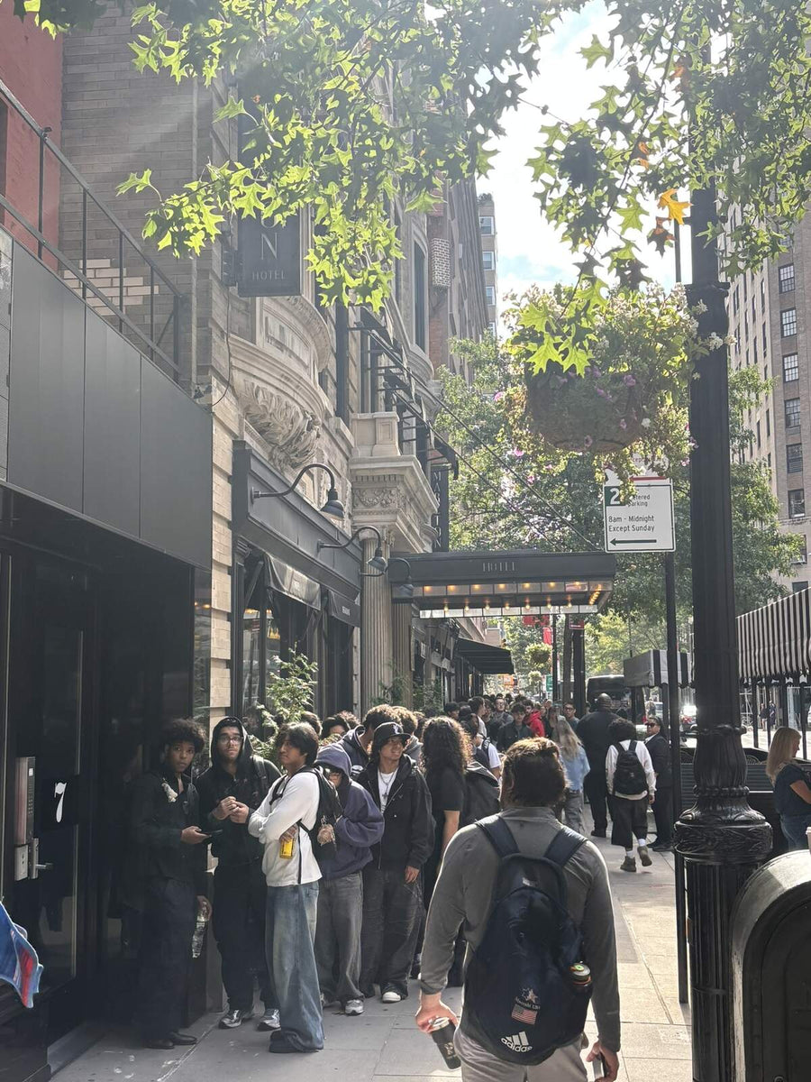 Line outside the NYFW pop-up on 8th Street